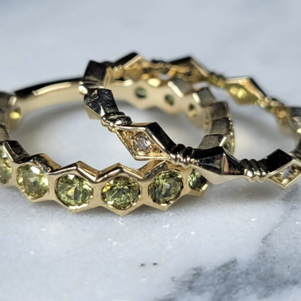 geometric stackable bands in yellow gold