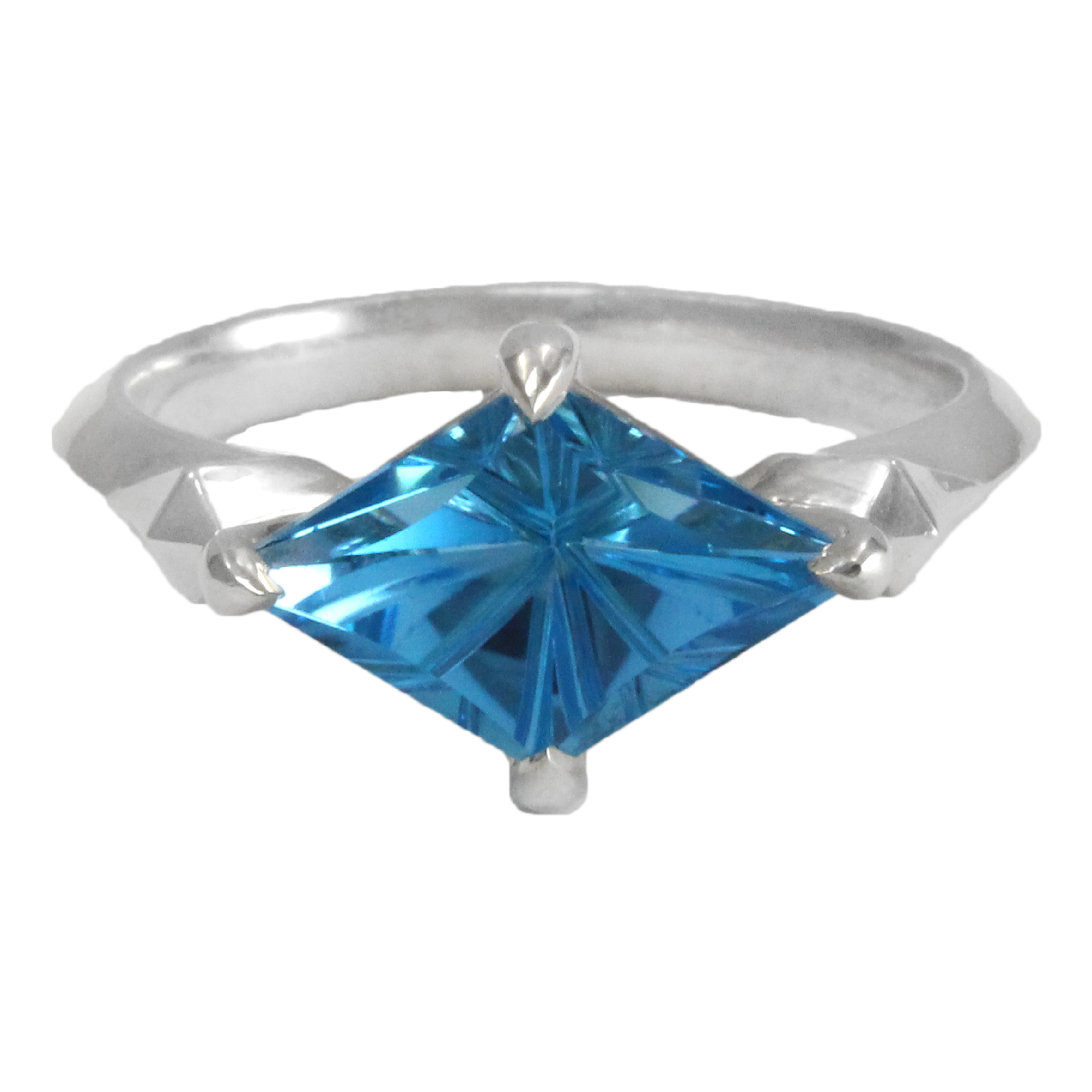 Kite Shaped Blue Topaz Pyramid Ring on white background