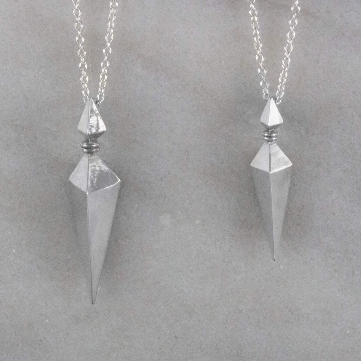 Large and Small Silver Pyramid Spike Pendants on Silver Chains Straight On View