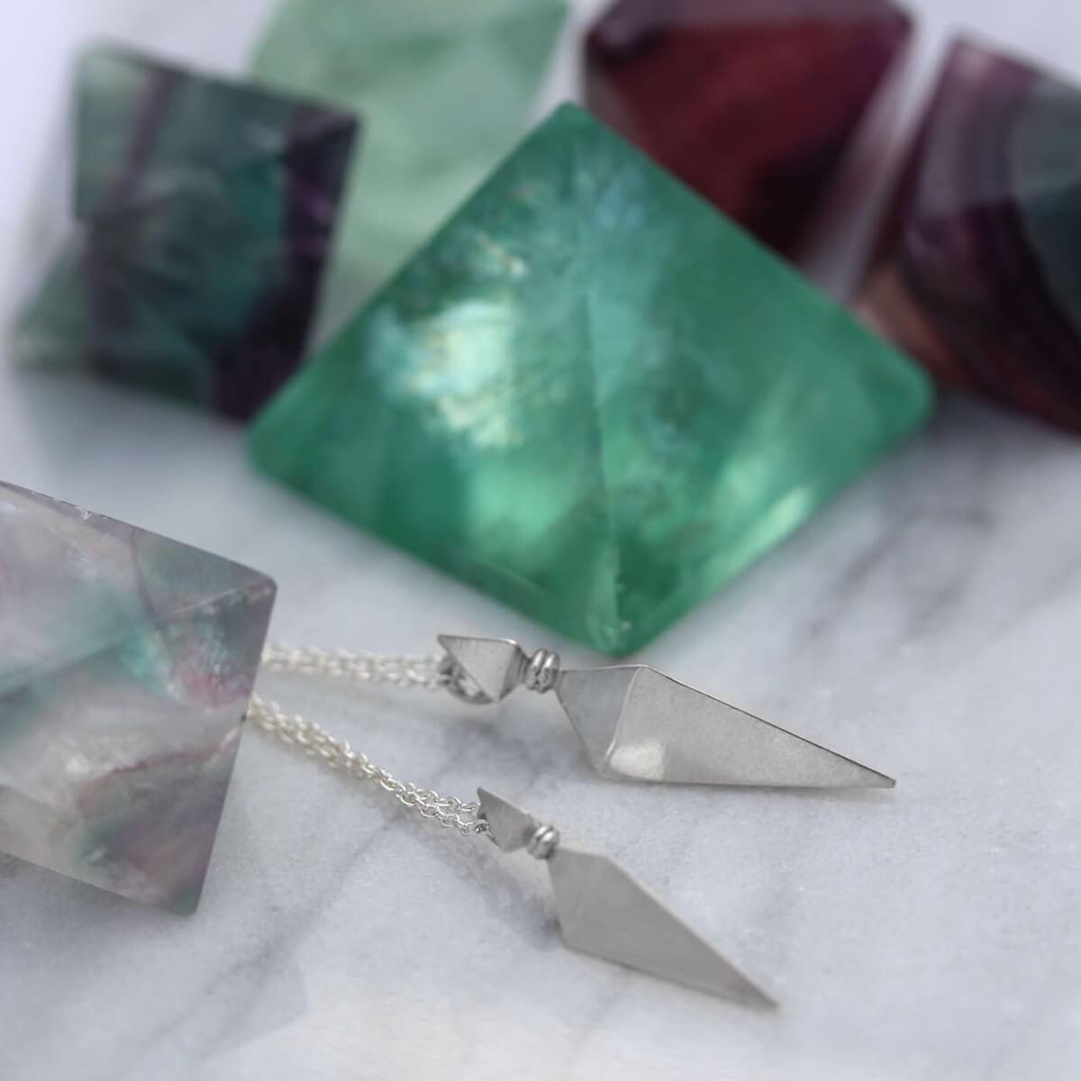 Large and Small Silver Pyramid Spike Pendants on Silver Chains with Fluorite Crystals